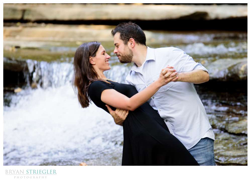 dip photo in front of waterfall
